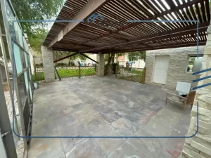 Covered outdoor seating area with pergola in a 5 bedroom villa for rent in Al Barsha Dubai